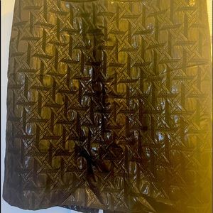 Black skirt with details small slit in back and zipper no elastic size 10